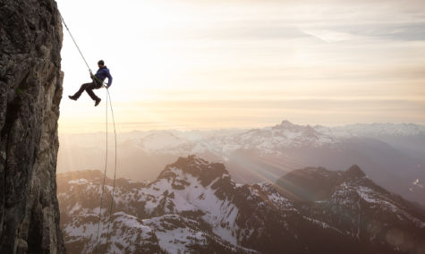 Epic Adventurous Extreme Sport Composite of Rock Climbing Man Rappelling
